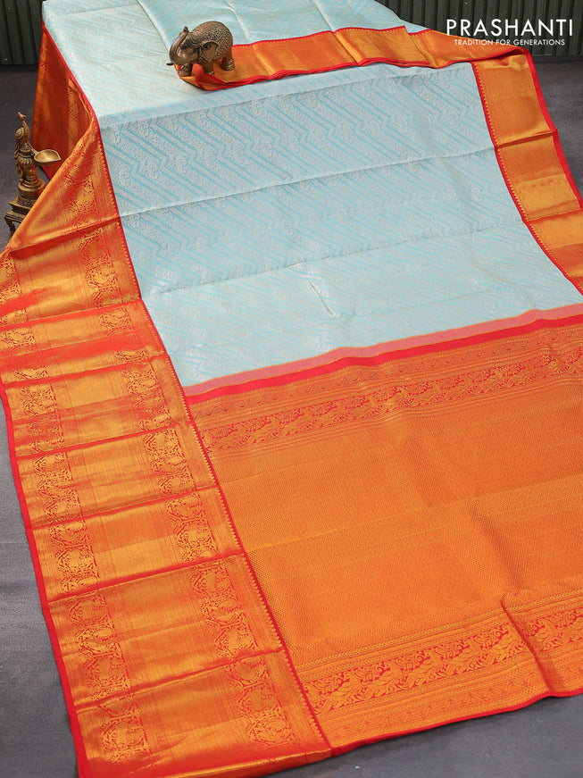 Pure kanjivaram silk saree light blue and red with allover silver zari woven brocade weaves and golden zari woven border
