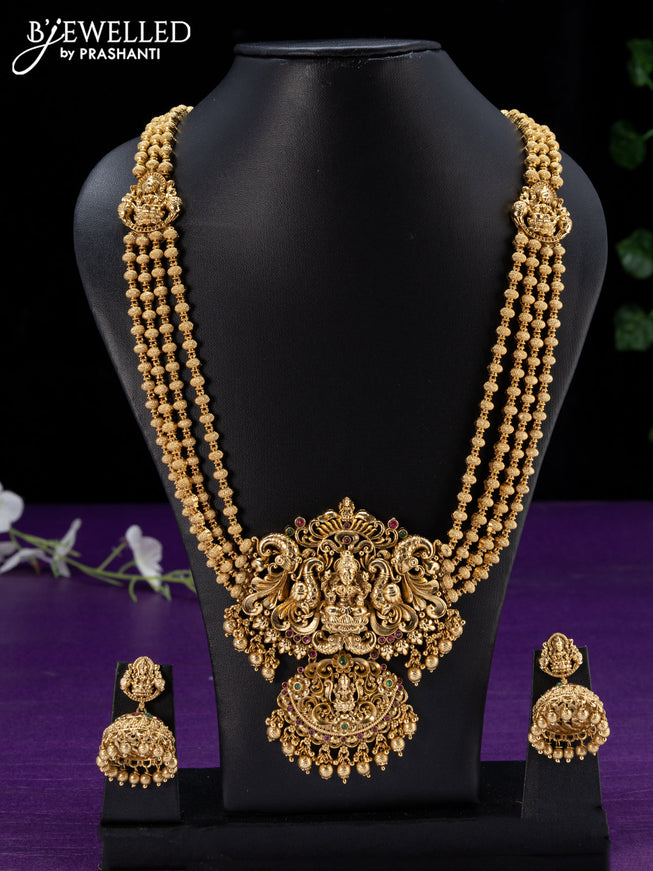 Antique haaram kemp stones with lakshmi pendant and golden beads hangings