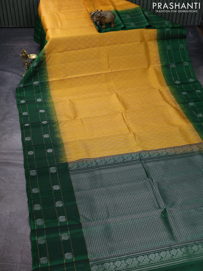Pure soft silk saree mustard yellow and green with allover zari weaves and zari woven butta border