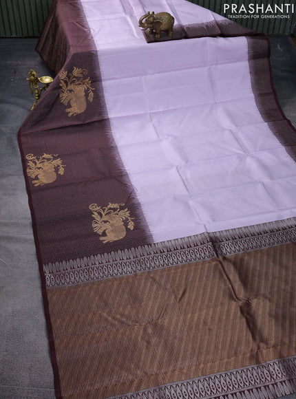 Pure soft silk saree pastel lavender and wine shade with allover zari weaves and long zari woven border