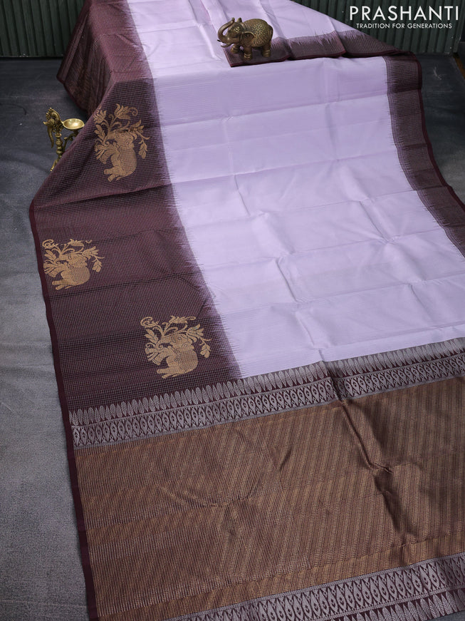 Pure soft silk saree pastel lavender and wine shade with allover zari weaves and long zari woven border