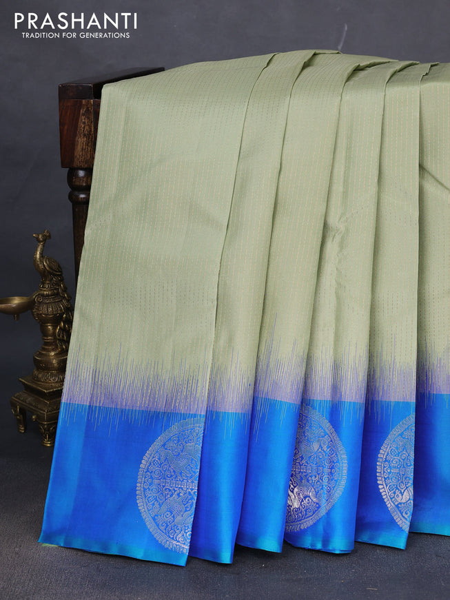 Pure soft silk saree pastel green and dual shade of blue with allover zari weaves and zari woven butta border