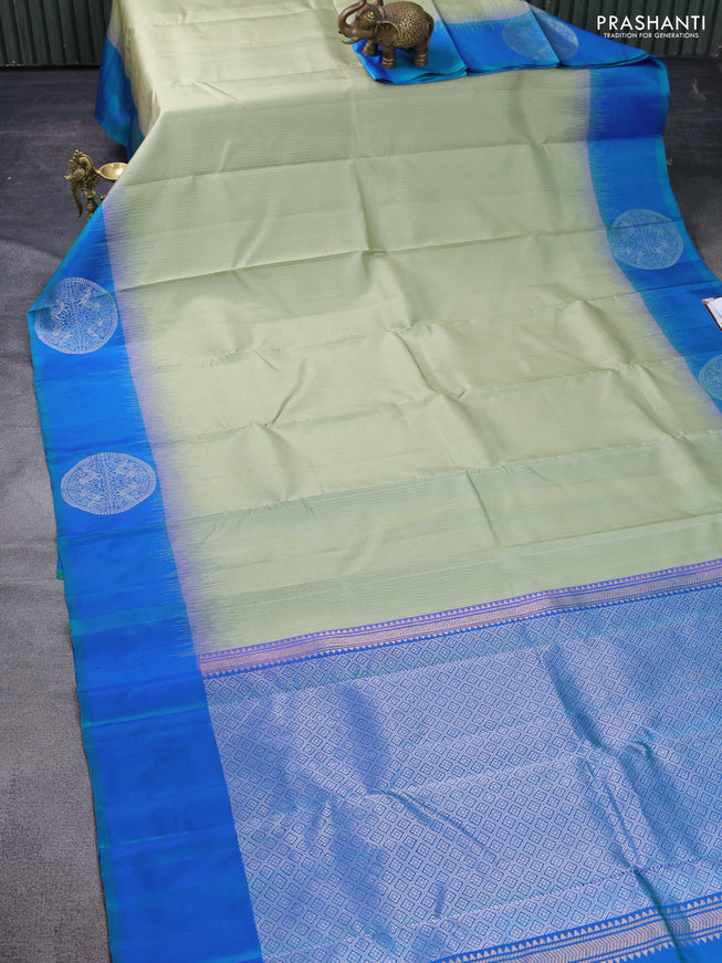 Pure soft silk saree pastel green and dual shade of blue with allover zari weaves and zari woven butta border