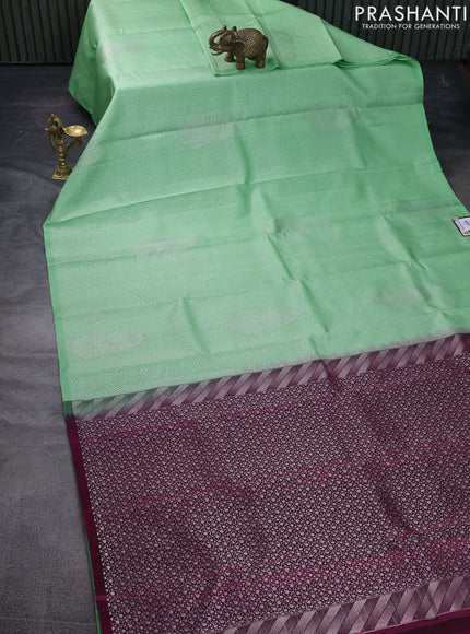 Pure soft silk saree pista green and dark magenta pink with allover self emboss in borderless style