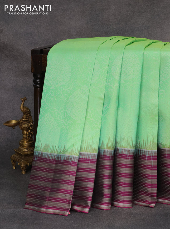 Pure soft silk saree light green and purple with allover silver zari woven brocade weaves and zari line border