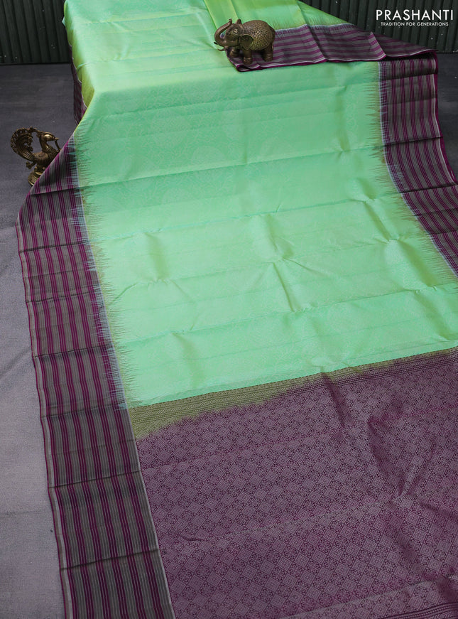 Pure soft silk saree light green and purple with allover silver zari woven brocade weaves and zari line border