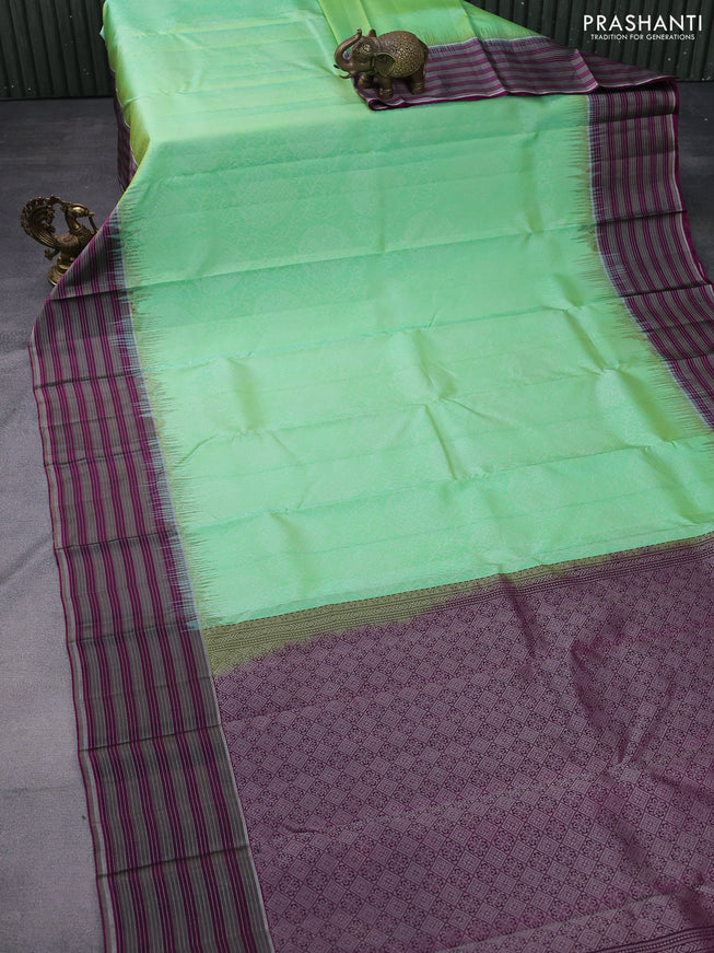 Pure soft silk saree light green and purple with allover silver zari woven brocade weaves and zari line border