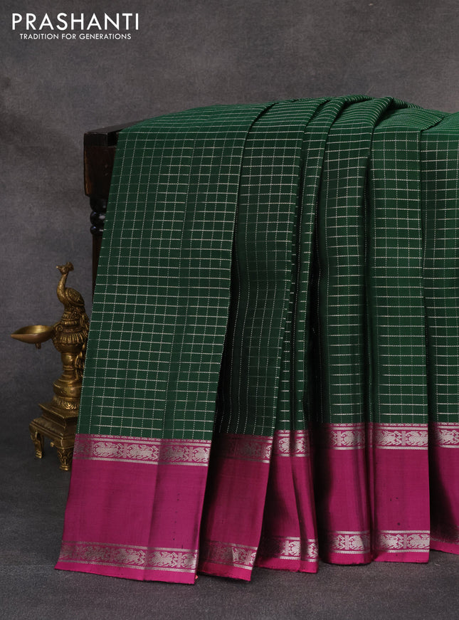 Pure soft silk saree green and dark magenta pink with allover silver zari checks and rettapet silver zari woven border