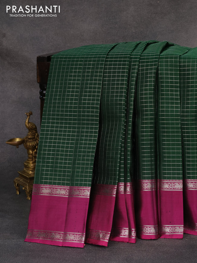 Pure soft silk saree green and dark magenta pink with allover silver zari checks and rettapet silver zari woven border