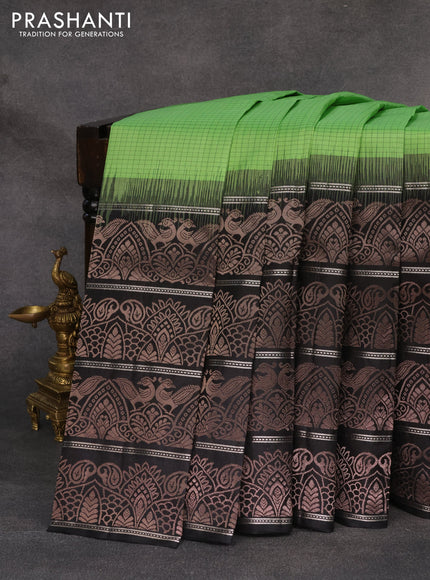 Pure soft silk saree light green and black with allover thread checked pattern and long zari woven border