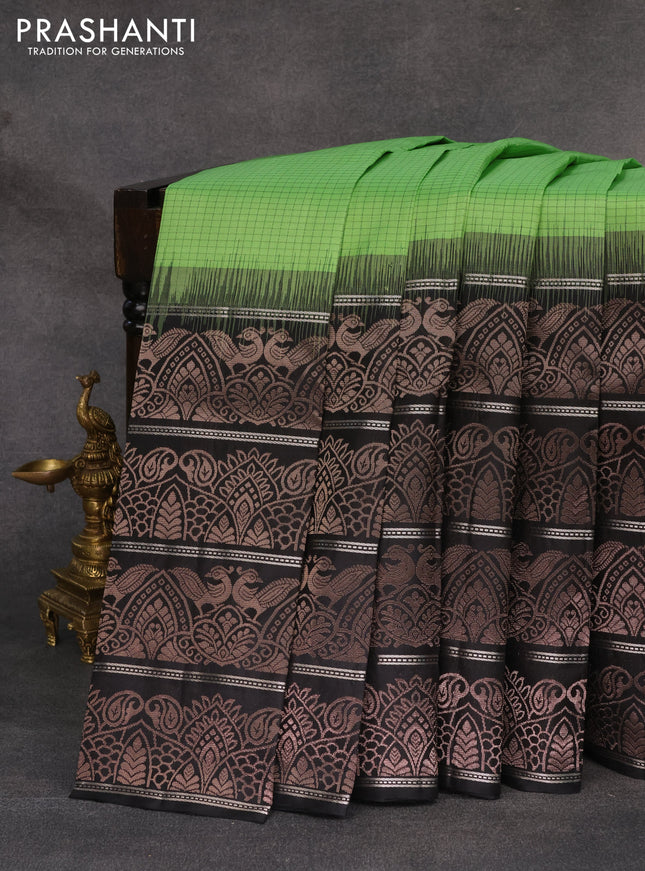 Pure soft silk saree light green and black with allover thread checked pattern and long zari woven border