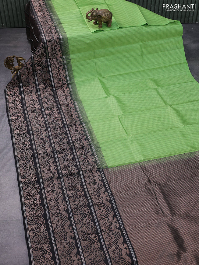 Pure soft silk saree light green and black with allover thread checked pattern and long zari woven border