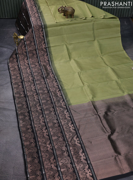 Pure soft silk saree pastel green and black with allover thread checked pattern and long zari woven border
