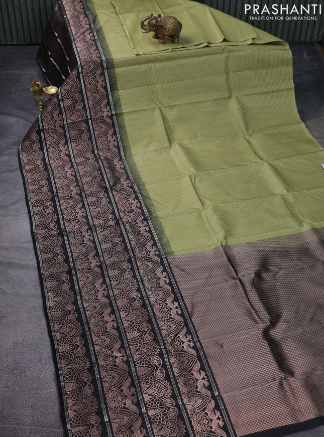 Pure soft silk saree pastel green and black with allover thread checked pattern and long zari woven border