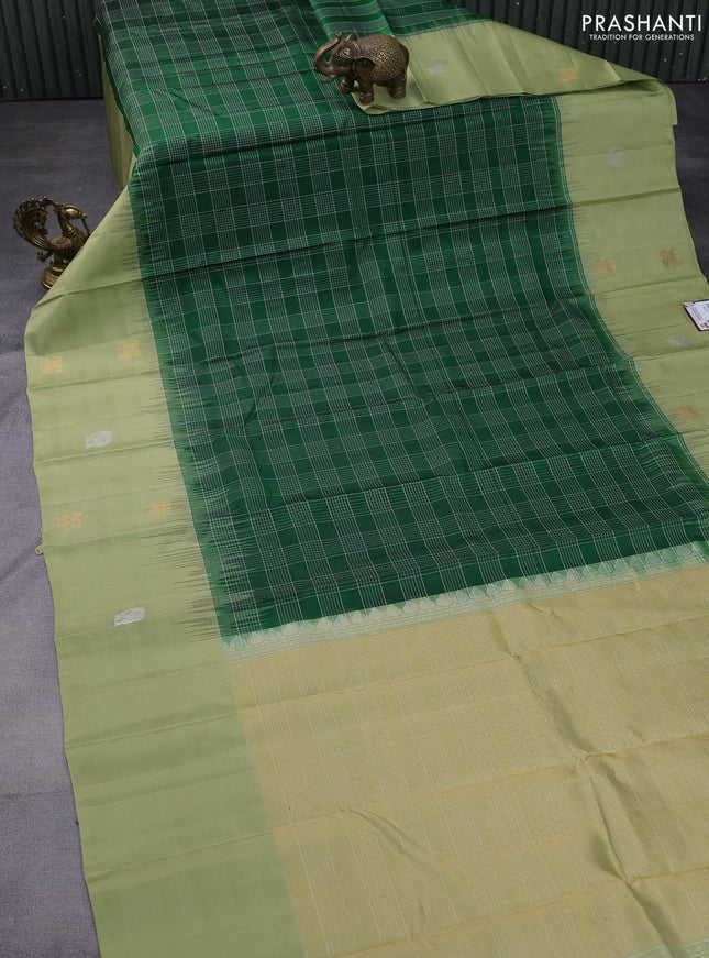 Pure soft silk saree green and pista green with allover silver zari checked pattern and zari woven butta border
