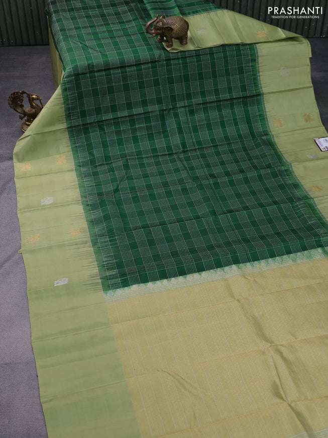 Pure soft silk saree green and pista green with allover silver zari checked pattern and zari woven butta border