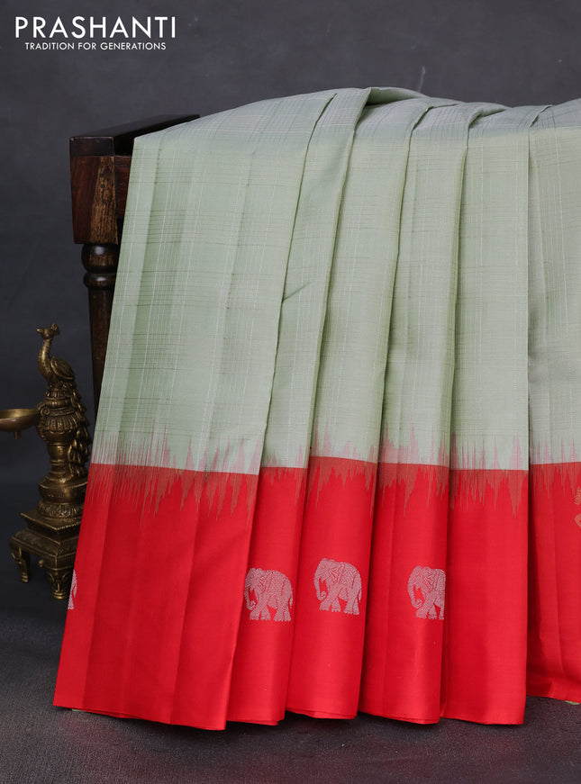 Pure soft silk saree pastel green and red with allover silver zari checked pattern and zari woven butta border