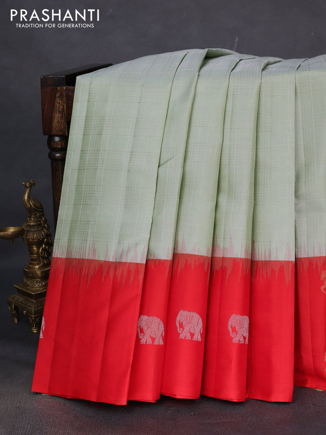Pure soft silk saree pastel green and red with allover silver zari checked pattern and zari woven butta border