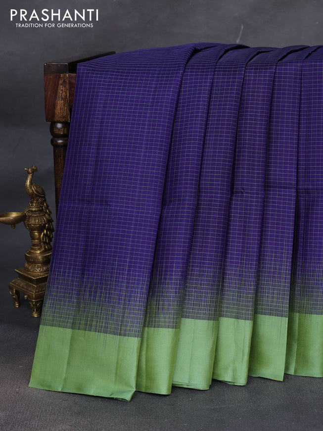 Pure soft silk saree blue and pastel green with allover checked pattern & zari woven buttas and simple border