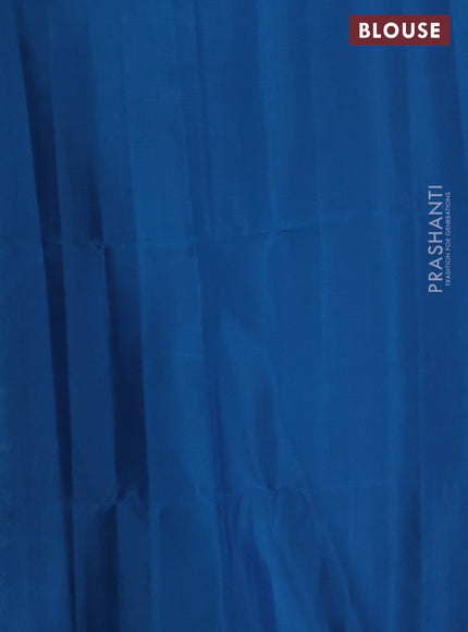 Pure soft silk saree grey shade and peacock blue with allover checked pattern & zari woven buttas and simple border