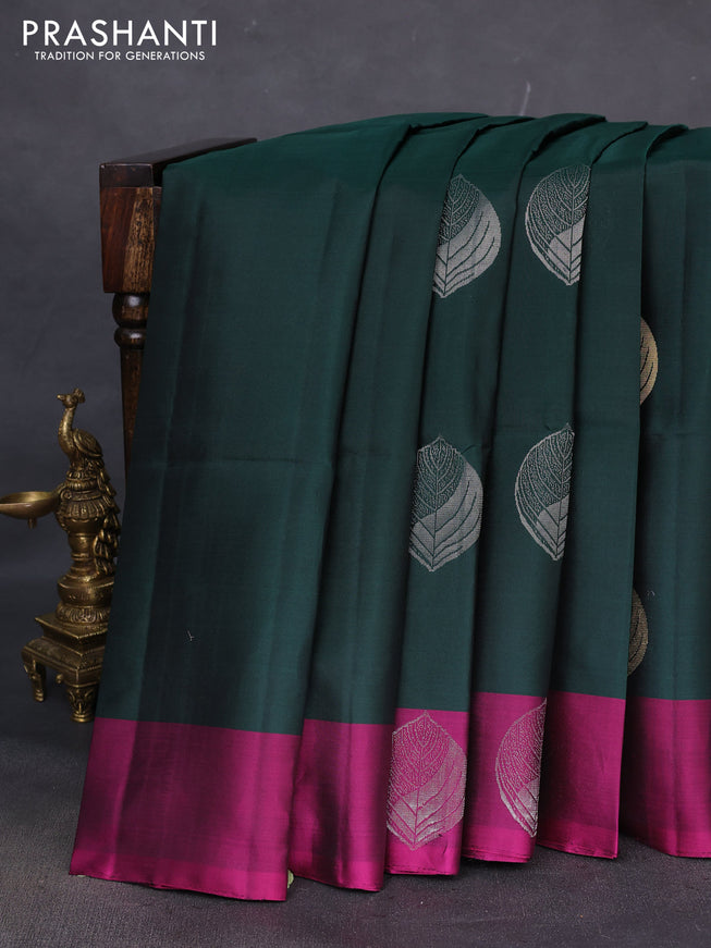 Pure soft silk saree bottle green and pink witn zari woven buttas and zari woven butta border