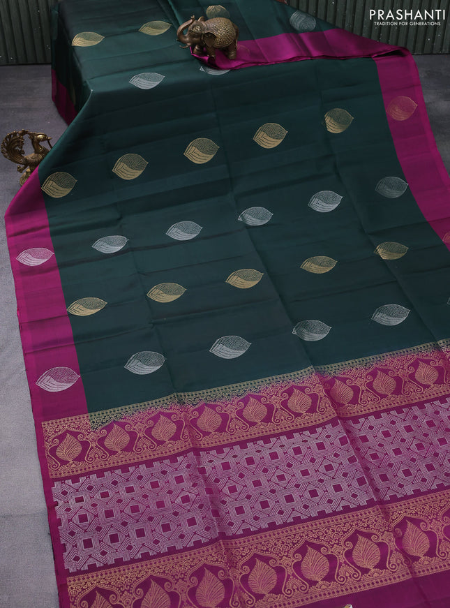 Pure soft silk saree bottle green and pink witn zari woven buttas and zari woven butta border