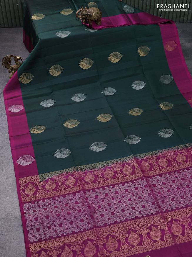 Pure soft silk saree bottle green and pink witn zari woven buttas and zari woven butta border