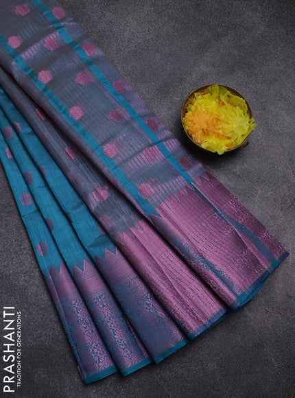 Semi raw silk saree teal blue with pink zari woven buttas and pink zari woven border