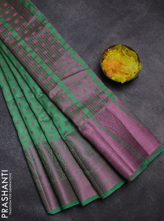 Semi raw silk saree pastel green with allover pink zari woven buttas and paisley design pink zari woven border