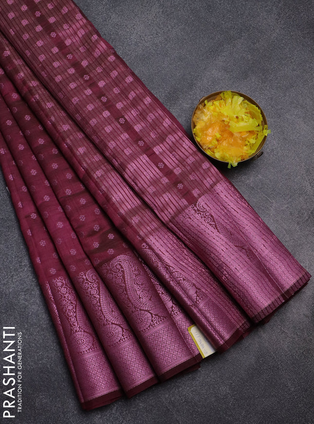 Semi raw silk saree wine shade with allover pink zari woven buttas and paisley design pink zari woven border