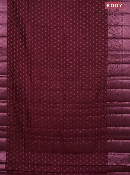 Semi raw silk saree wine shade with allover pink zari woven buttas and paisley design pink zari woven border