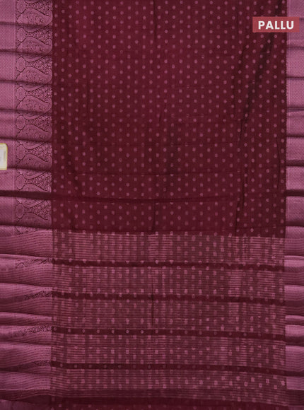 Semi raw silk saree wine shade with allover pink zari woven buttas and paisley design pink zari woven border