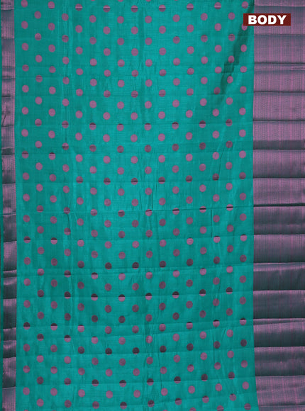 Semi raw silk saree teal green with allover pink zari woven buttas and pink zari woven border