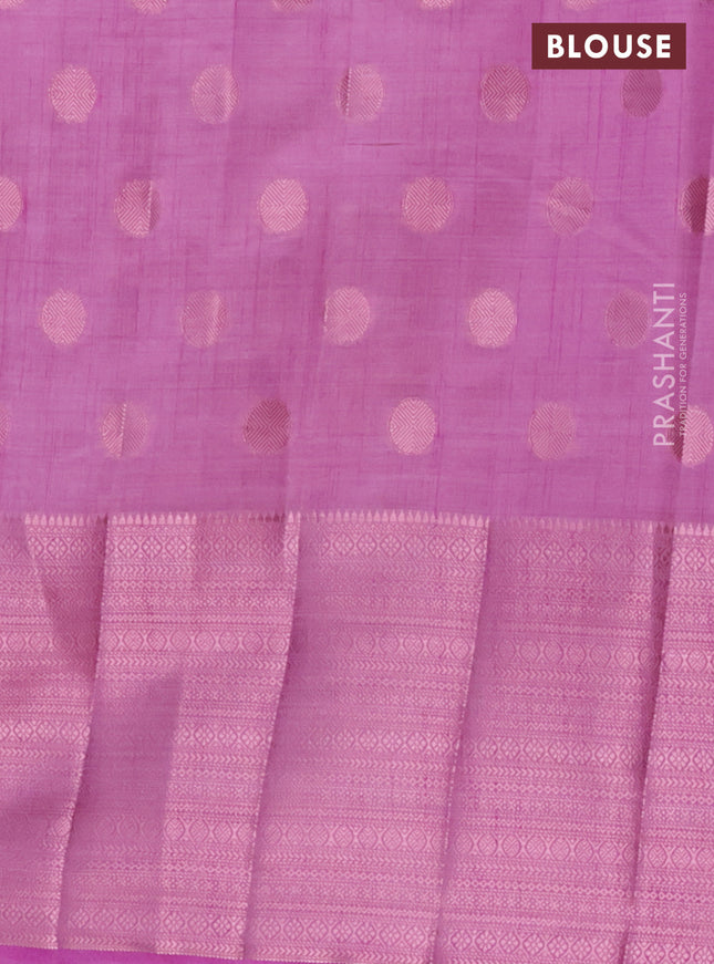 Semi raw silk saree lavender shade with allover pink zari woven buttas and pink zari woven border