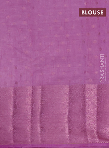 Semi raw silk saree lavender shade with allover pink zari woven buttas and pink zari woven border