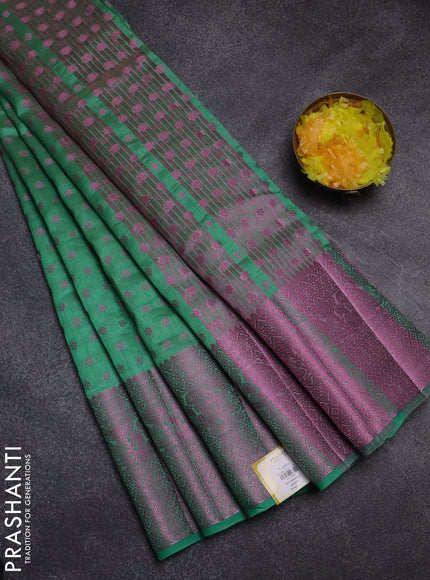Semi raw silk saree pastel green with allover pink zari woven buttas and pink zari woven border