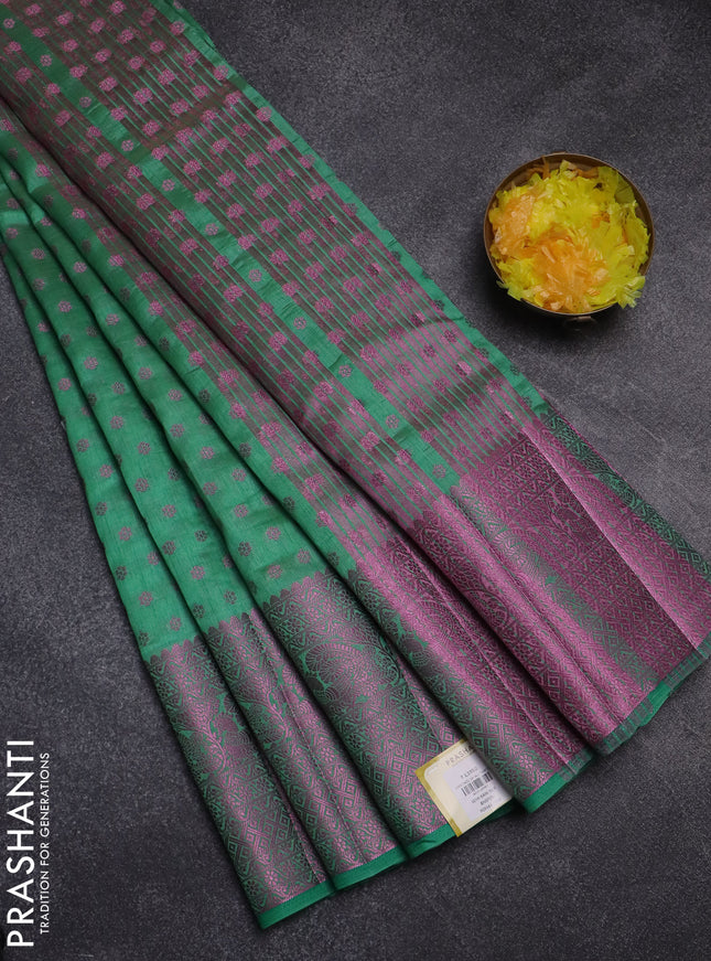 Semi raw silk saree pastel green with allover pink zari woven buttas and pink zari woven border