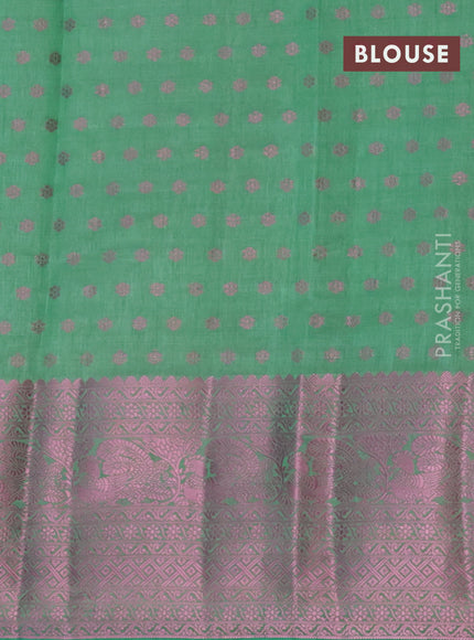 Semi raw silk saree pastel green with allover pink zari woven buttas and pink zari woven border