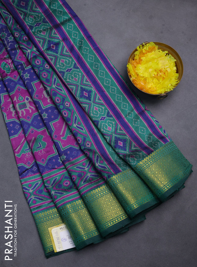 Semi tussar saree blue and green with allover patola prints and ikat woven zari border