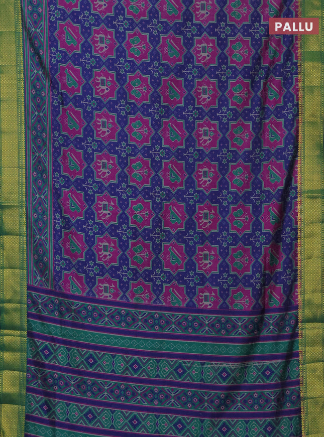 Semi tussar saree blue and green with allover patola prints and ikat woven zari border