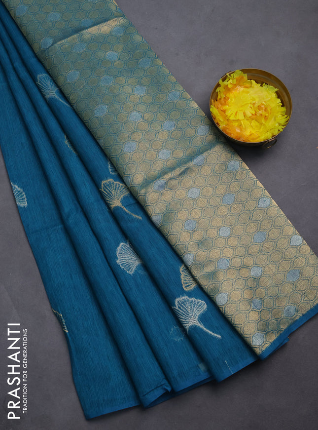 Semi jute linen saree peacock blue with silver and gold zari woven floral buttas in borderless style