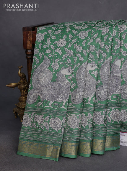 Printed silk saree green with allover kalamkari prints and zari woven border