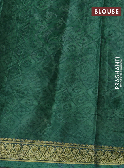 Printed silk saree green with allover kalamkari prints and zari woven border