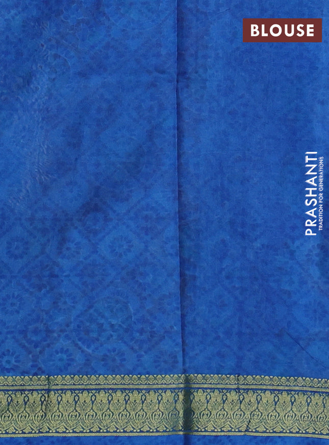 Printed silk saree cream and blue with allover floral prints and zari woven border