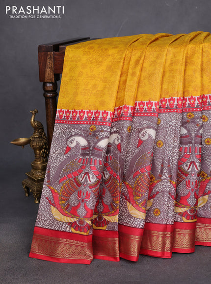 Printed silk saree yellow and red with allover prints and long printed zari border