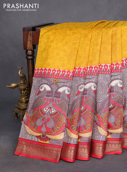 Printed silk saree mustard yellow and red with allover prints and long printed zari border