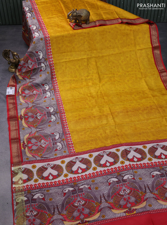 Printed silk saree mustard yellow and red with allover prints and long printed zari border