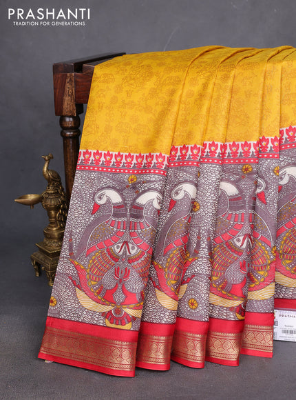 Printed silk saree mustard yellow and red with allover prints and long printed zari border