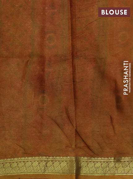 Printed silk saree red and dark mustard with allover ikat prints and zari woven border