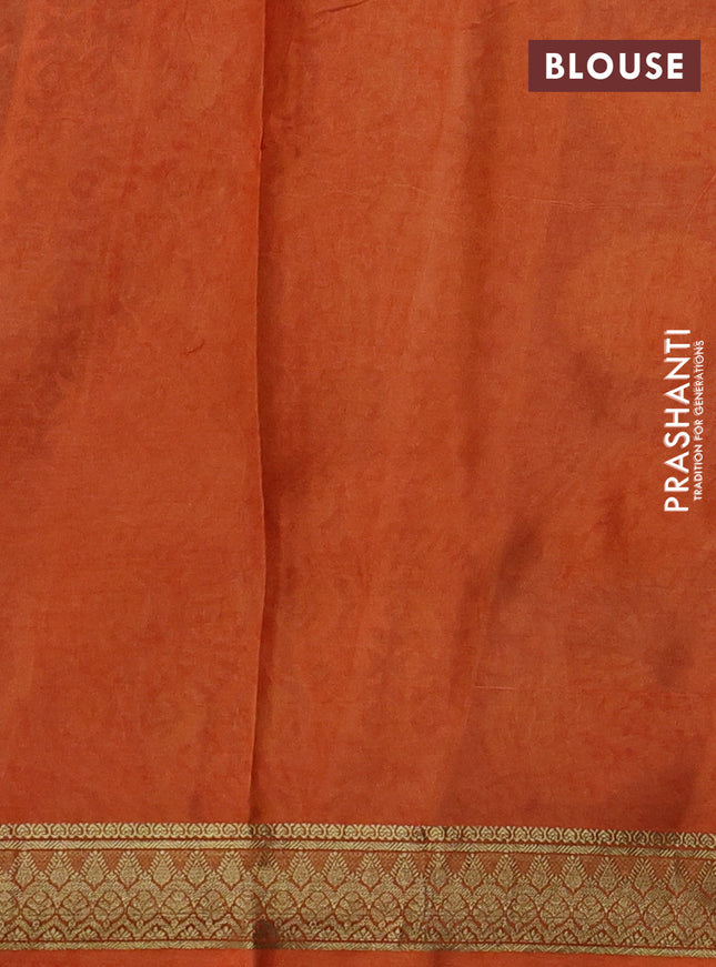 Printed silk saree grey shade and orange with allover kalamkari prints and zari woven border